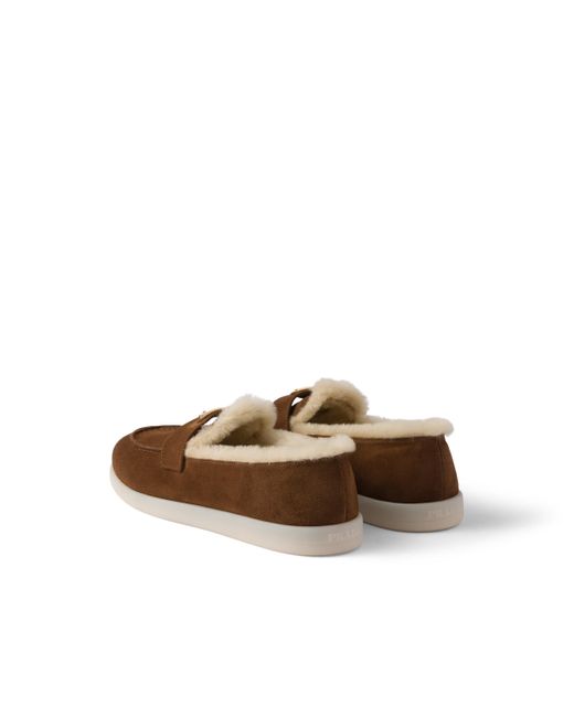 Mocasines con logo triangular Prada de color Brown