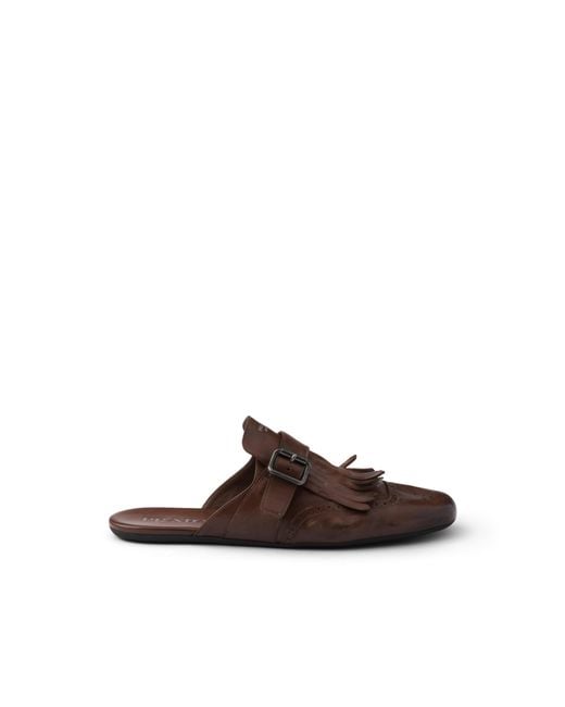 Prada Brown Shuffle Antiqued Leather Mules With Buckled Strap And Fringe for men