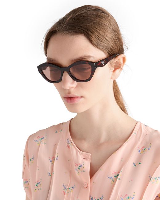 Prada Pink Sunglasses With Logo