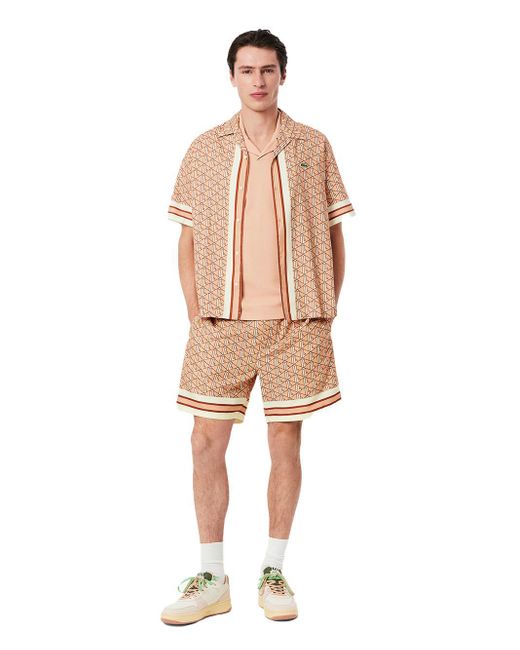 Bermuda Logo Monogram All-Over di Lacoste in Natural da Uomo