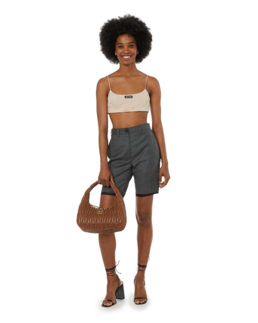 Top bralette à logo Miu Miu en coloris Black