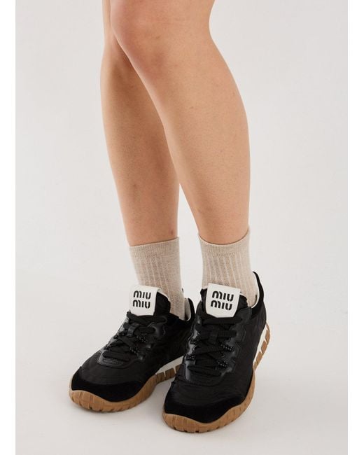 Baskets Tyre en tissu technique et cuir Miu Miu en coloris Black