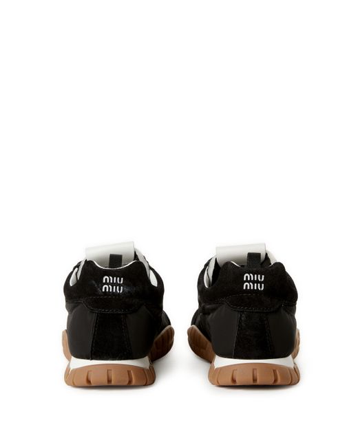 Baskets Tyre en tissu technique et cuir Miu Miu en coloris Black