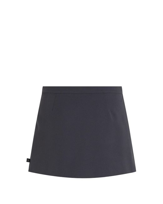 Jupe courte portefeuille Calvin Klein en coloris Blue