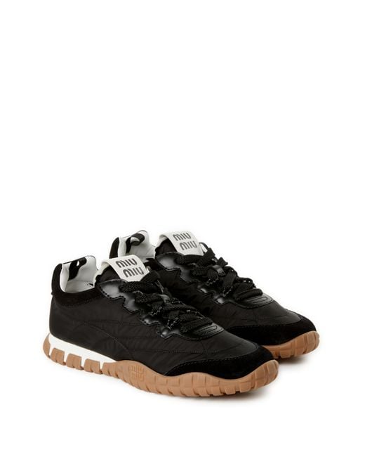Baskets Tyre en tissu technique et cuir Miu Miu en coloris Black