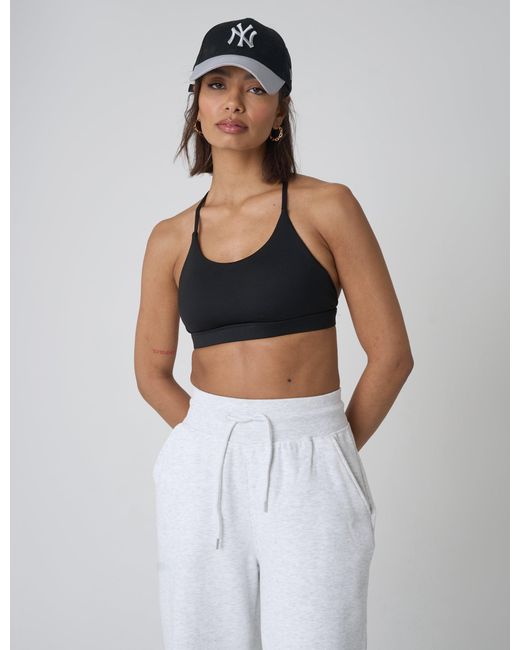 Public Desire Blue Cross Over Back Detail Sports Bra Black