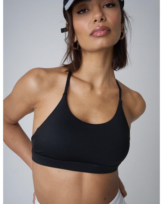 Public Desire Blue Cross Over Back Detail Sports Bra Black