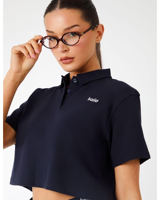 Public Desire Blue Kaiia Label Logo Short Sleeve Crop Polo Top Navy