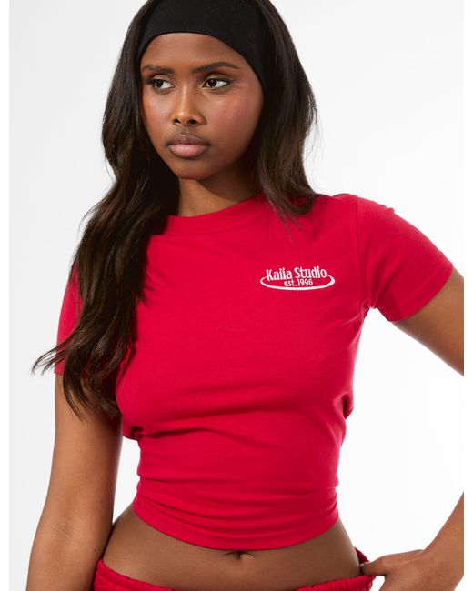Public Desire Kaiia Running Club Logo Longline Baby Tee Red
