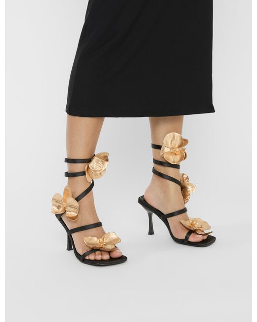 Public Desire Lotus Black Satin & Gold Flower Trim Wrap Around Flared Stiletto High Heels