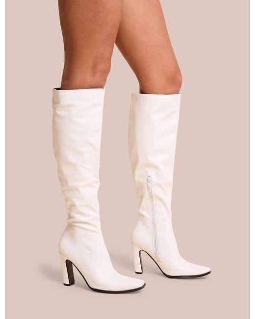 Public Desire Acquilla White Knee High Flared Boots
