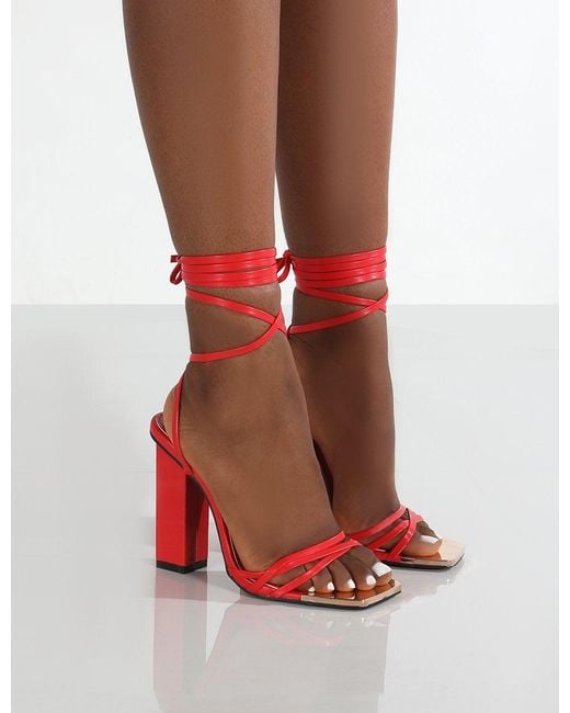 strap up red heels