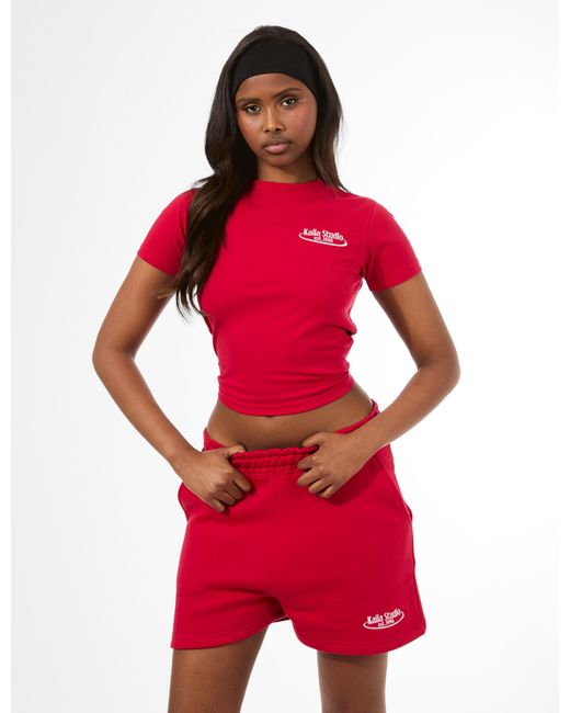 Public Desire Kaiia Running Club Logo Longline Baby Tee Red