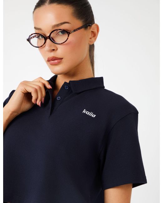 Public Desire Blue Kaiia Label Logo Short Sleeve Crop Polo Top Navy