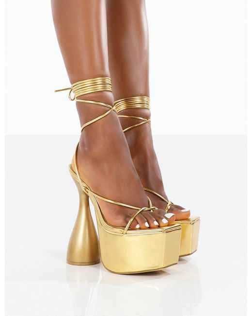 Public Desire Story Wide Fit Gold Pu Lace Up Cylinder Platform Heels in  Metallic | Lyst
