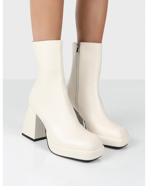 Buy Inornever Women's Chunky High Heel Ankle Booties Fashion Buckle Platform  PU Combat Boots Online at desertcartINDIA