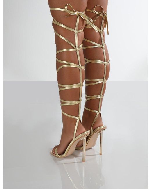 Knee high strap clearance up heels