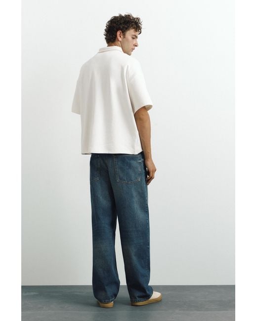 Polo Interlock Graphique Zippé Pull&Bear pour homme en coloris White