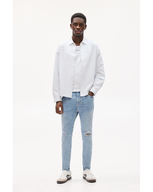 Pull&Bear Blue Ripped Carrot Fit Jeans for men