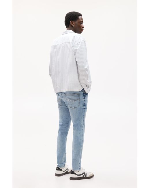 Pull&Bear Blue Ripped Carrot Fit Jeans for men