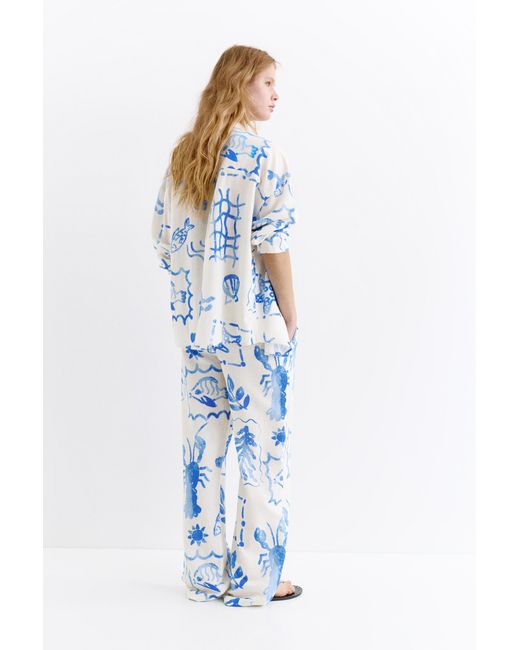 Pull&Bear Blue Flowing Marine Print Trousers