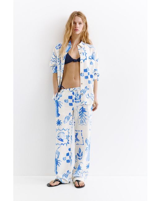 Pull&Bear Blue Flowing Marine Print Trousers