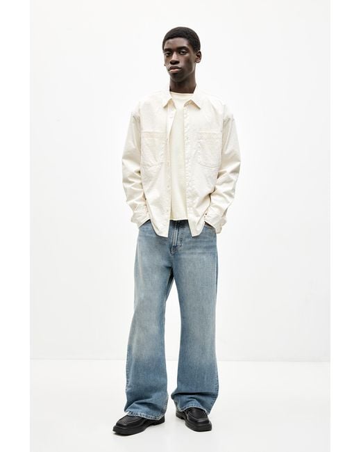Pull&Bear Blue Loose Flared Jeans for men