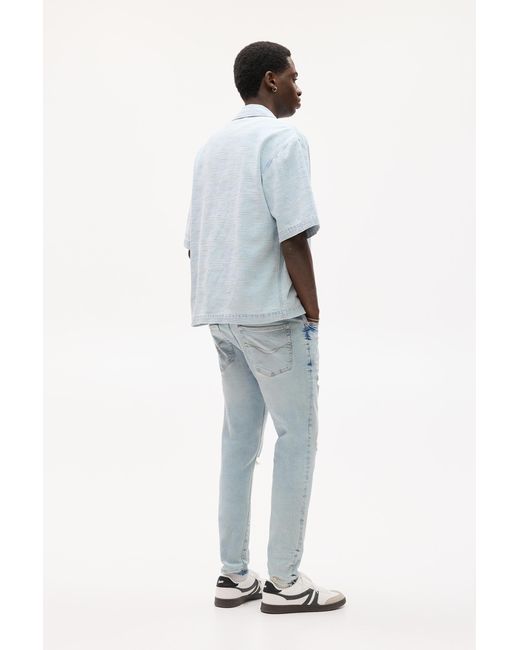 Pull&Bear Blue Ripped Carrot Fit Jeans for men