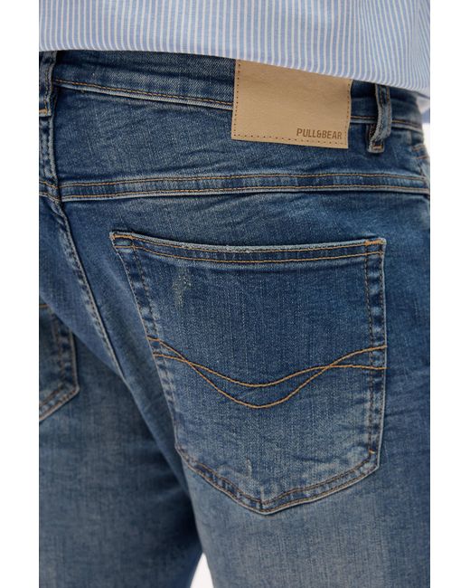 Pull&Bear Carrot Fit Jeans Zierrisse in Blue für Herren