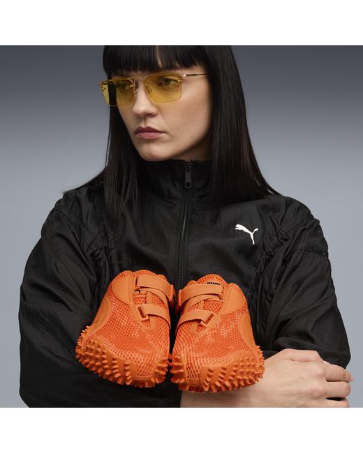 PUMA Orange Mostro Sneakers Schuhe, Rickie /Schwarz