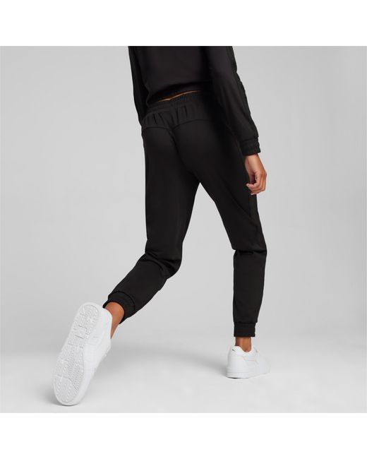 PUMA Black X PAMELA REIF Jogginghose mit schmal zulaufendem Bein