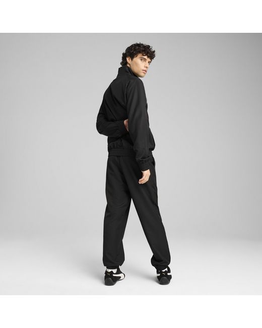 PUMA Gewebter Trainingsanzug mit Paspeln in Black für Herren