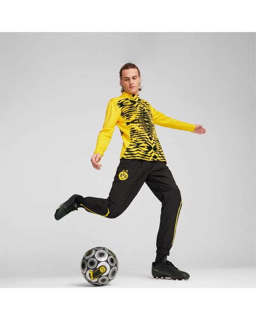 Maglia pre-partita con zip a un quarto Borussia Dortmund da di PUMA in Yellow