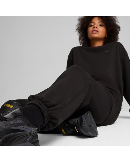 PUMA Essentials Elevated Uniseks joggingbroek in het Black