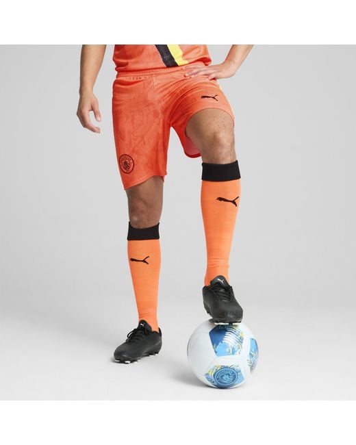 PUMA Kid Super X Manchester City Shorts Herren in Orange für Herren