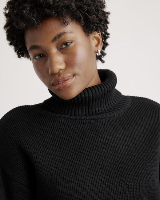 Designer black turtleneck hot sale sweater