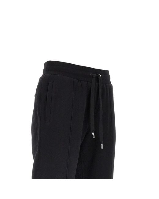 Dolce & Gabbana Black French Terry Pants With Logo Plate for men