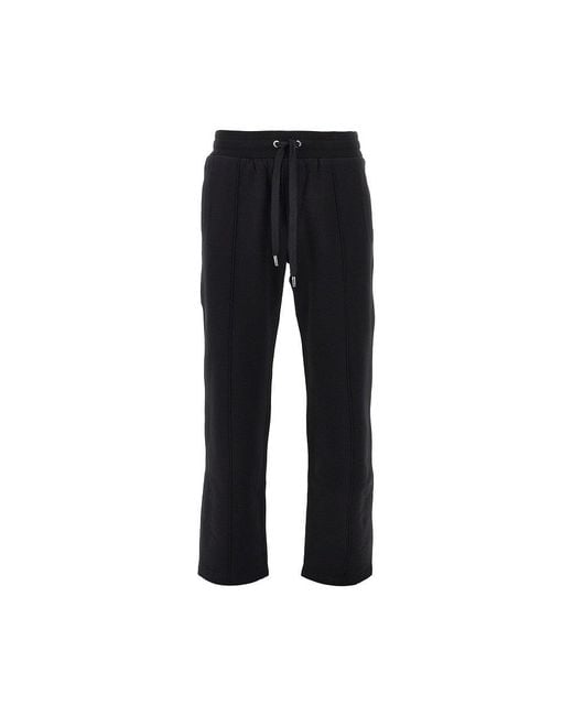 Dolce & Gabbana Black French Terry Pants With Logo Plate for men