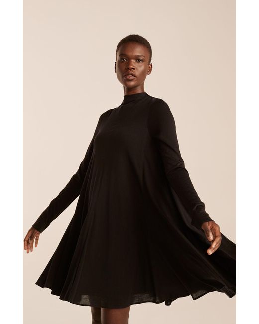 turtleneck trapeze dress