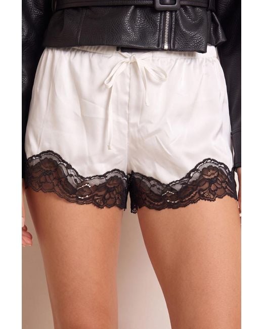 Rebellious Fashion White Satin Contrast Lace Trim Shorts