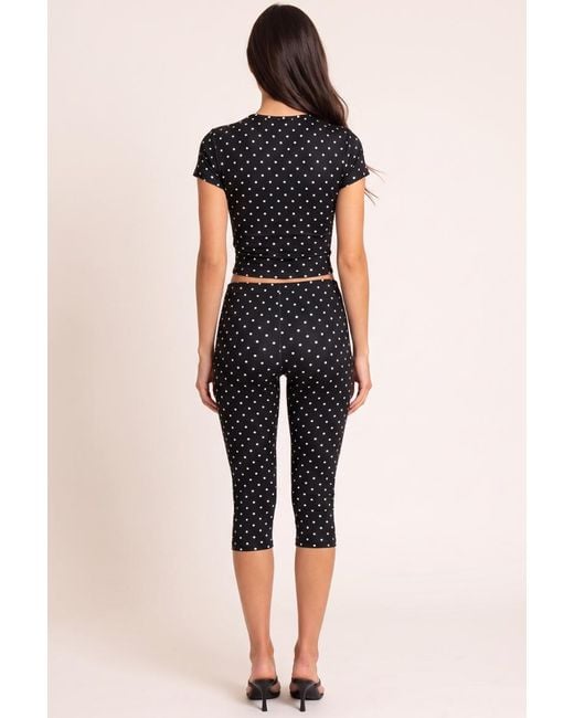 Rebellious Fashion Black Cut Out Top And Capri Pants Co-Ord Set