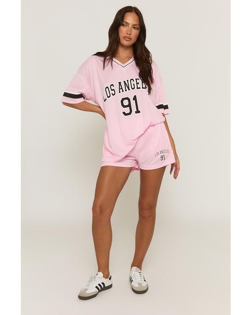 Rebellious Fashion Pink Oversized Varsity Football T-Shirt And Shorts Set