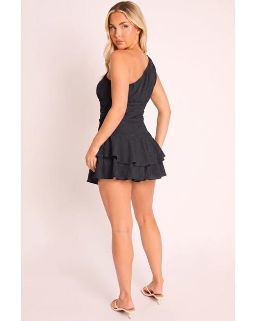 Rebellious Fashion Black One Shoulder Textured Flippy Playsuit