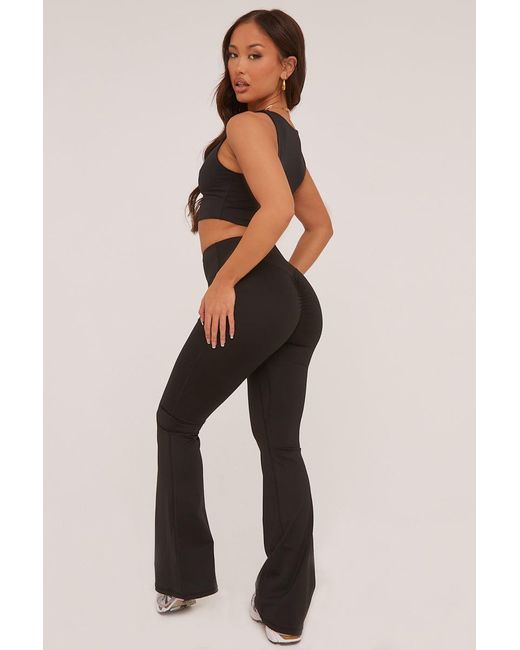 Rebellious Fashion Black Ruched Back Flared Leg Trousers