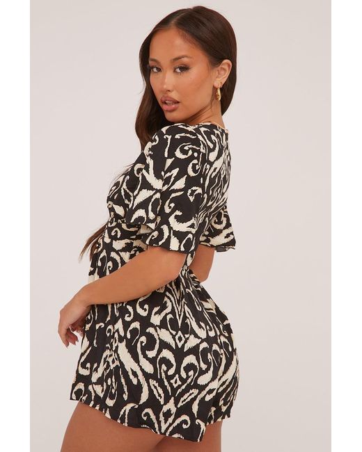 Rebellious Fashion Black Abstract Print Frill Detail Playsuit