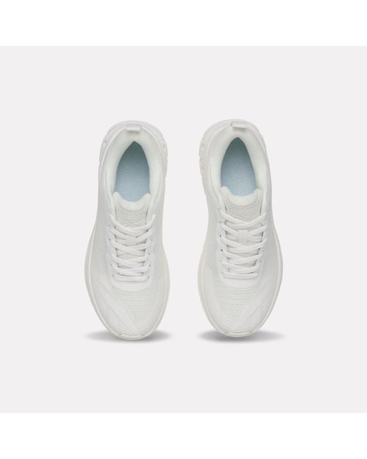 Reebok White Road Strider Junior Trainers
