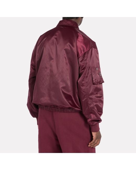 Reebok Varsity Coach Jasunisex, Afmeting in het Red
