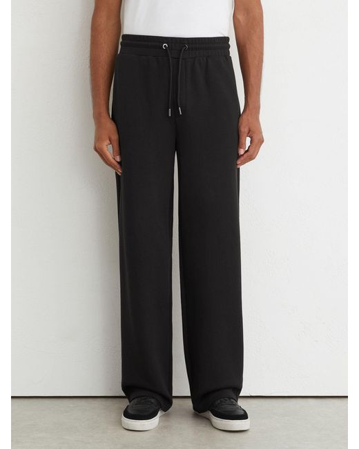 Reiss Black Sueded Interlock Jersey Relaxed-Fit Joggers for men