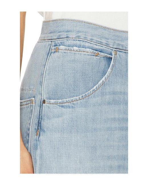 Lovers + Friends Blue Light Engine Low Rise Twist Seam Jeans