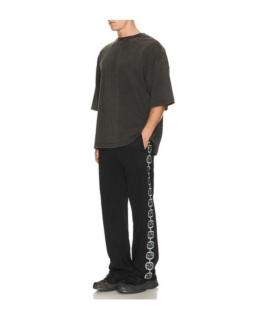 Pleasures Black Mythic Hope Track Pants for men
